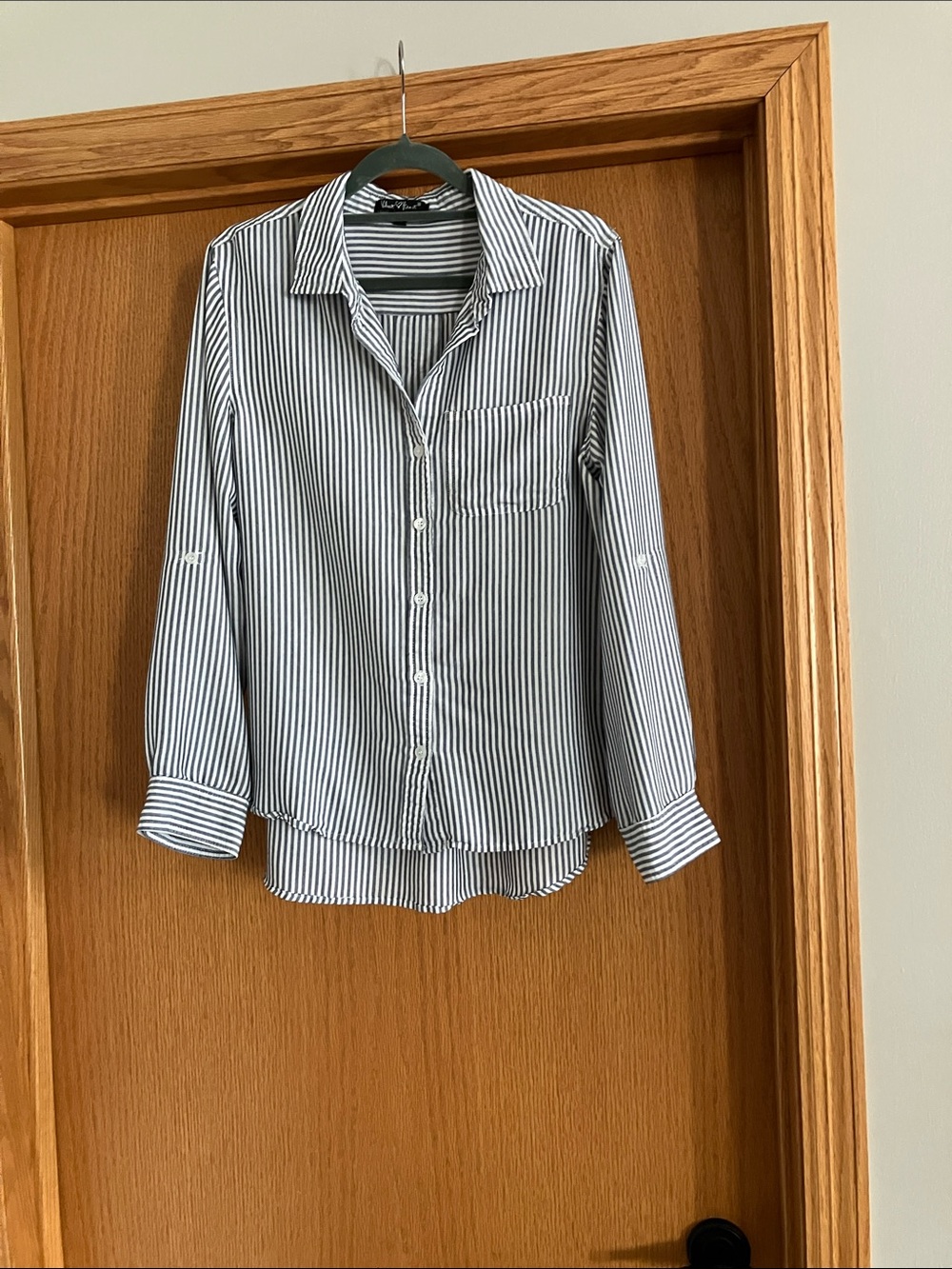 Gray and white stripe long sleeved button down shirt